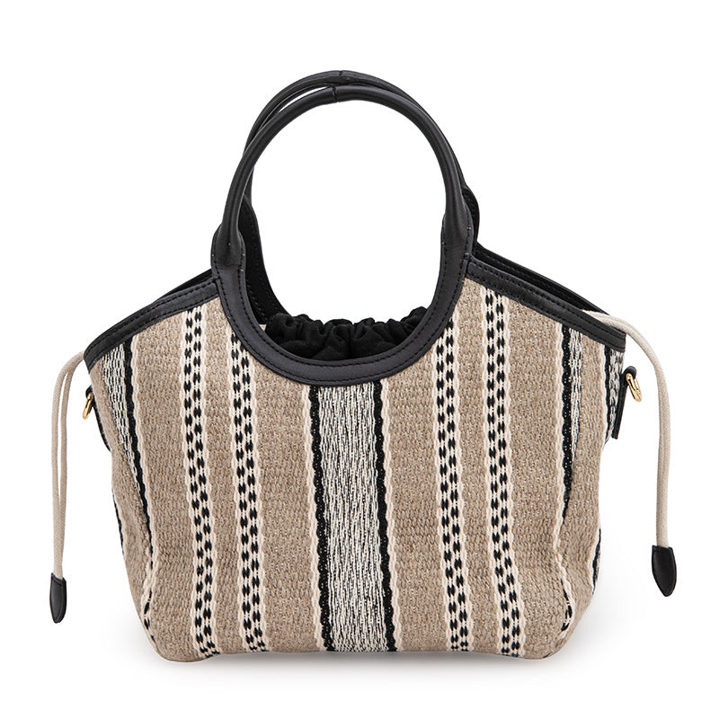 Handmade straw woven bag for women, summer high-end niche one-shoulder commuting hand-held basket bag